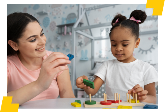 Professora brincando com a aluna